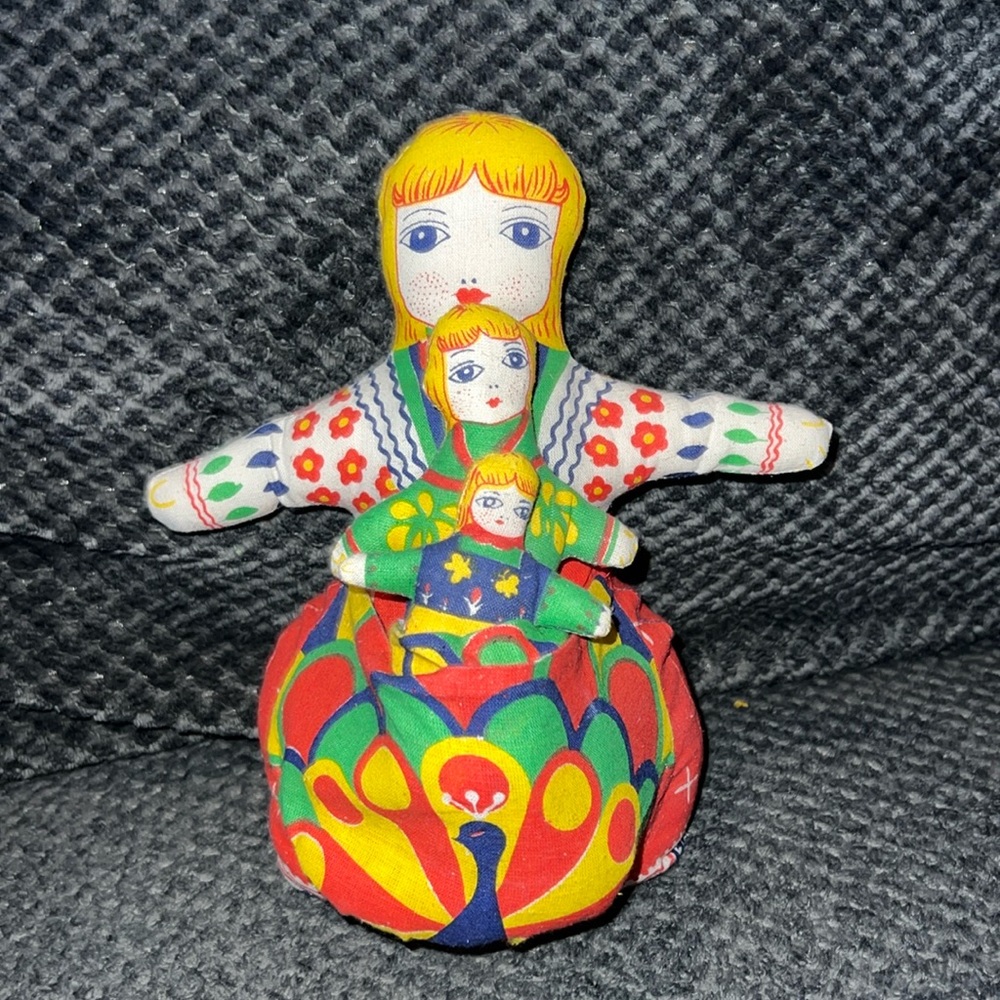 3 vintage nesting dolls--Each doll fits‎ in pockets of dolls